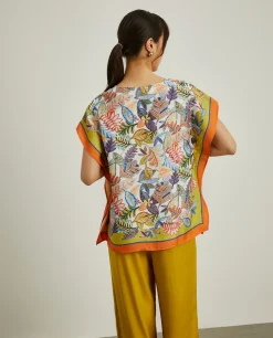 MULHER LION OF PORCHES Blusas^Blusa estilo poncho com padrão tropical